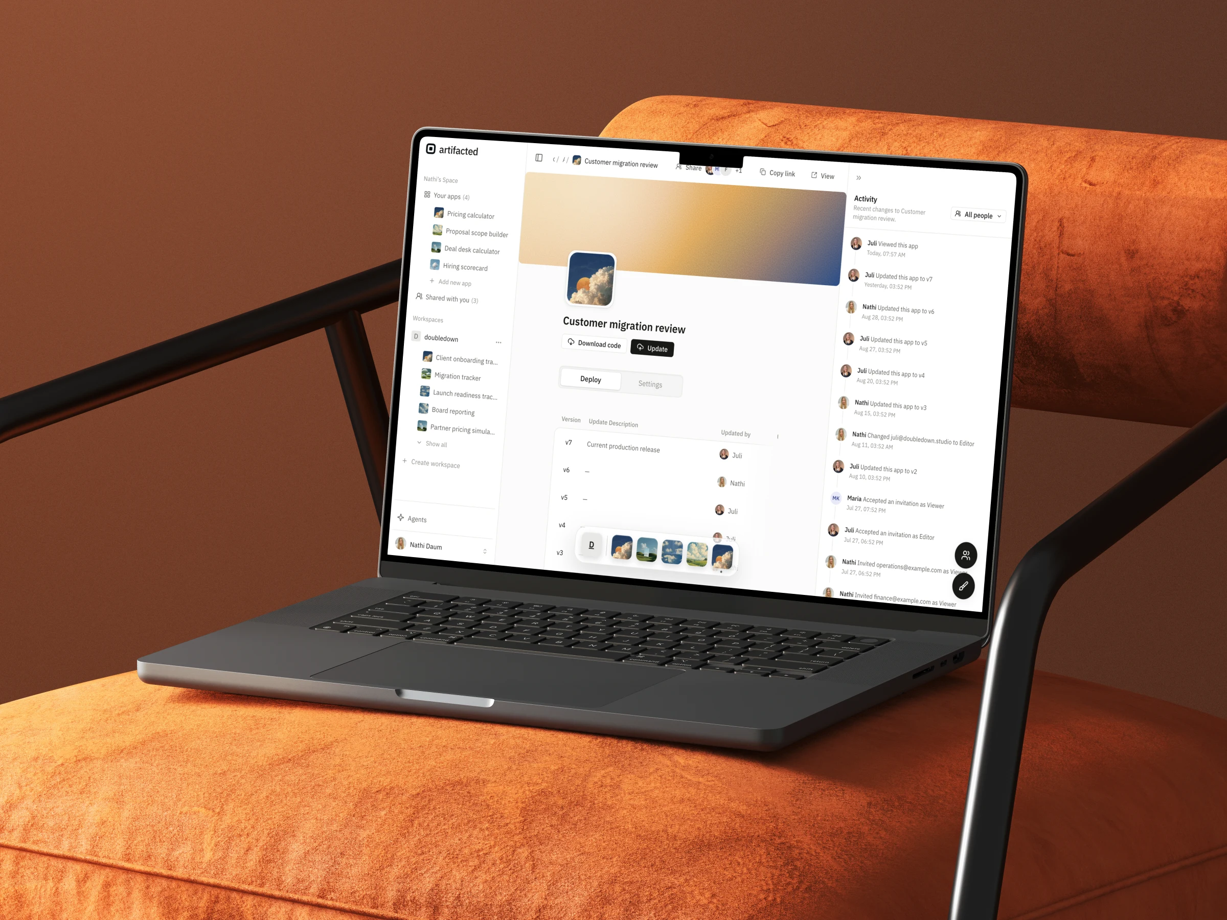 artifacted app detail in light mode on a laptop in an orange lounge