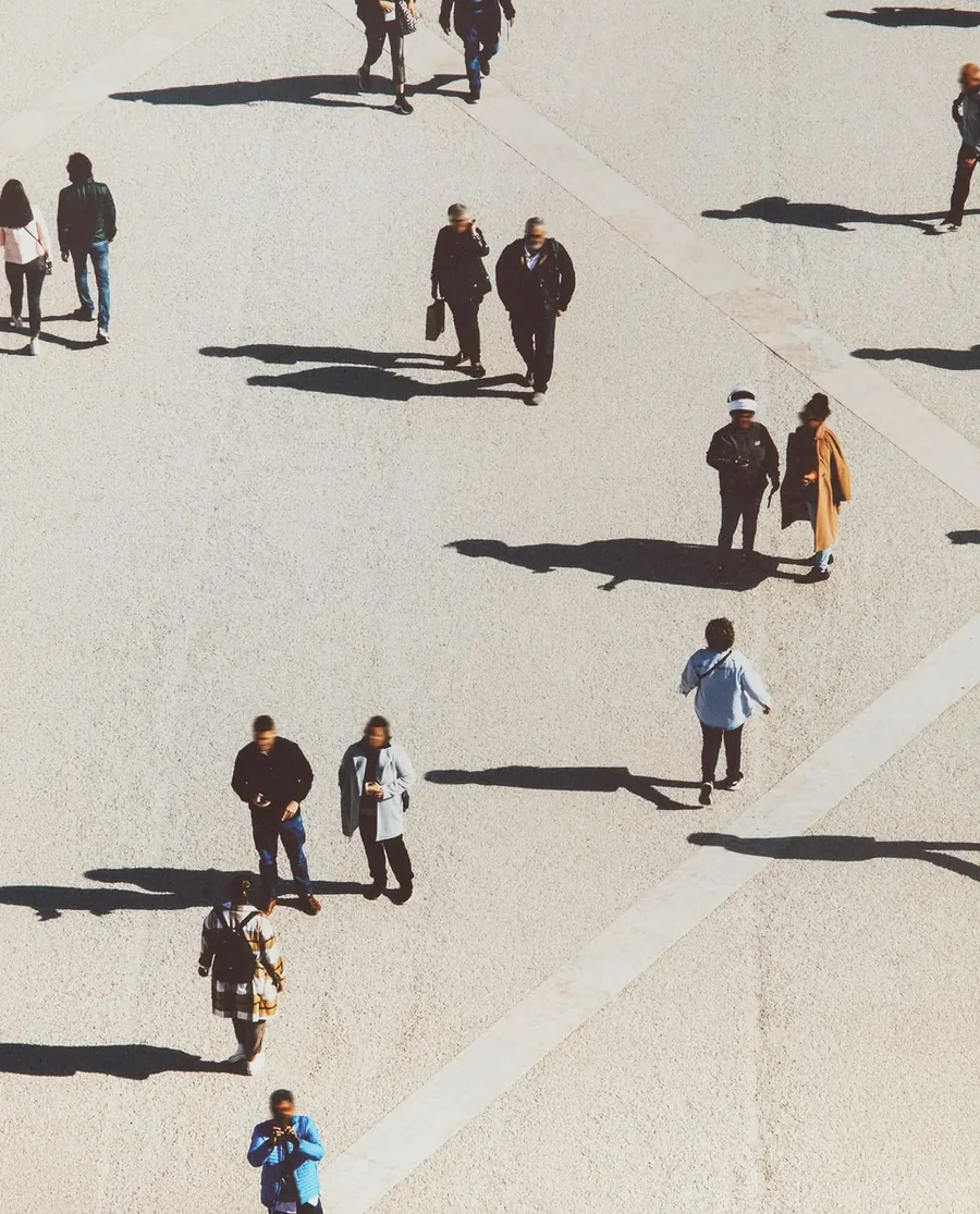A crowd crossing a square, seen from above