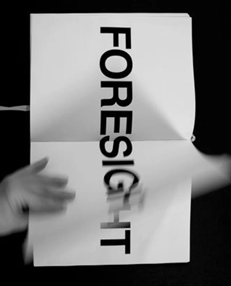 The word foresight set across a folded sheet