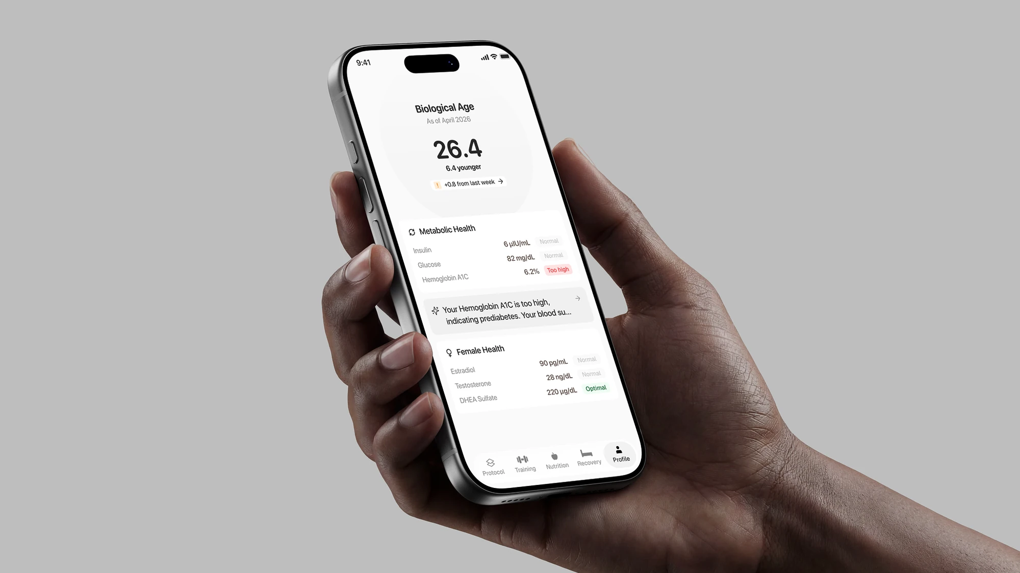 The Protocol Health app held in a hand, the biological age screen open