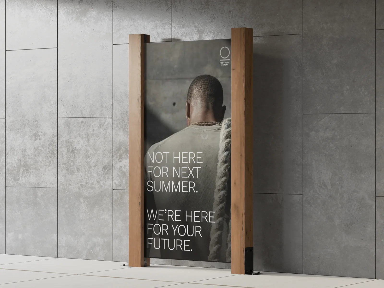 A poster on a wooden stand: Not here for next summer. We're here for your future.
