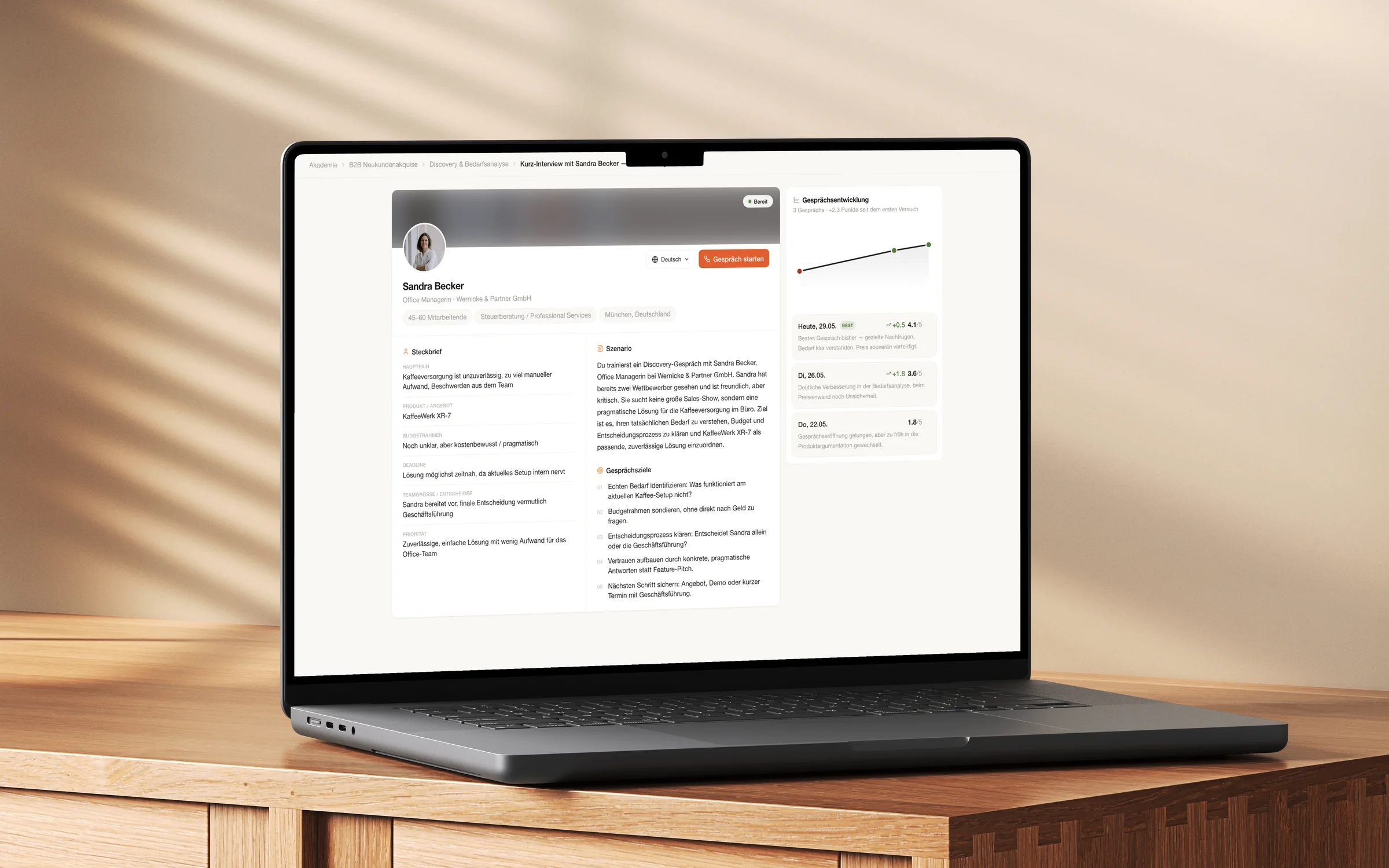 The Setero call brief open on a laptop, standing on a wooden sideboard